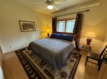 Main floor master bedroom with king bed